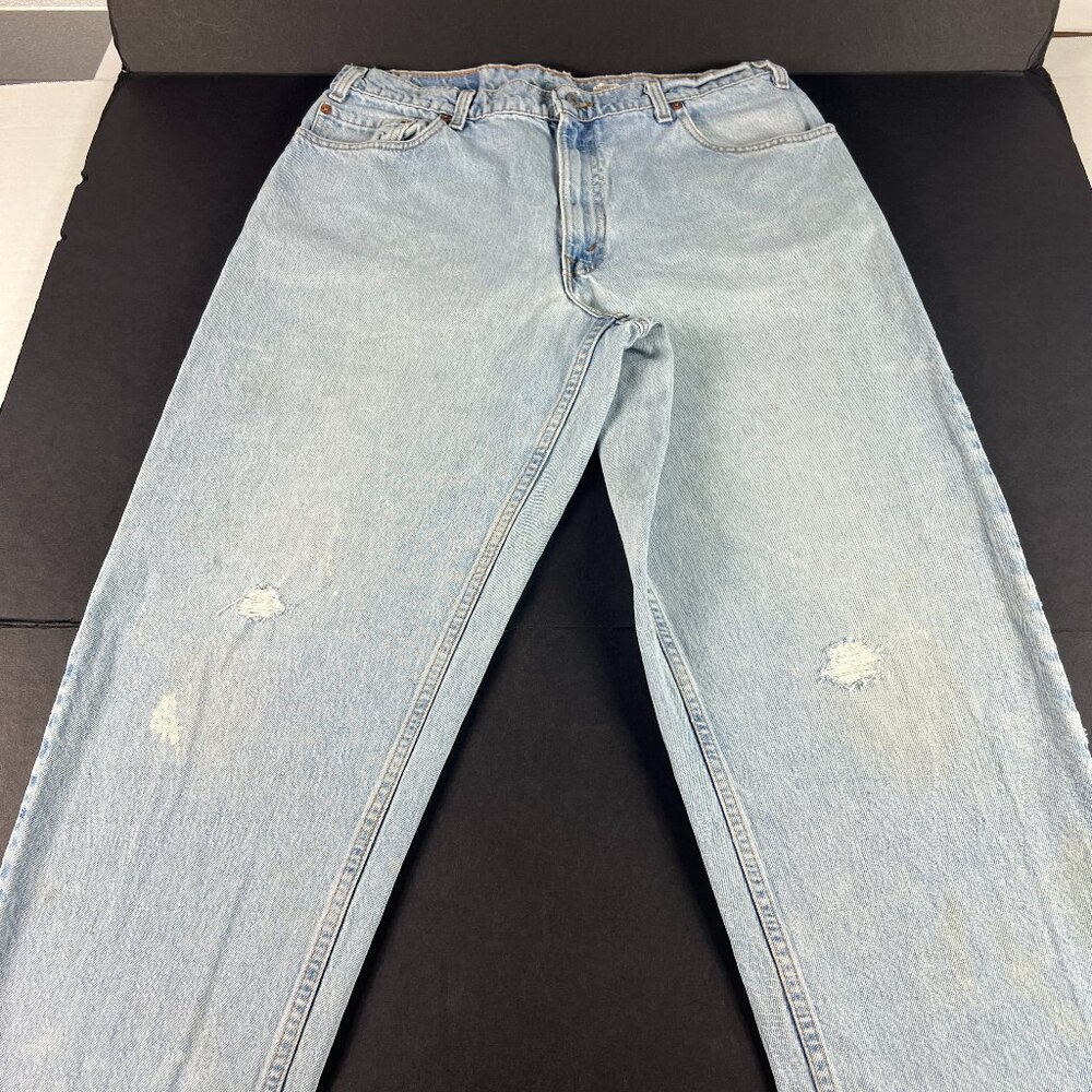 VTG 90s Levis Jeans Men's 34x31* 560 Loose Tapered Blue Thrashed Denim Tag 36x32